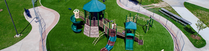 An aerial view of a playground using Genesis turf