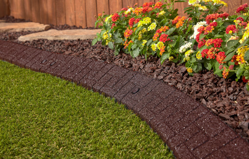 Lasting Beauty Curb Edging in a flower bed