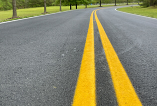 A road that's been paved with rubberized asphalt