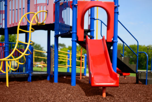 GroundSmart Rubber Mulch Nuggets at a playground.