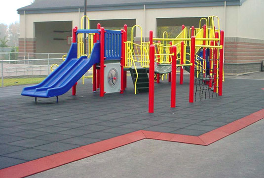 KidKushion mats installed in a playground