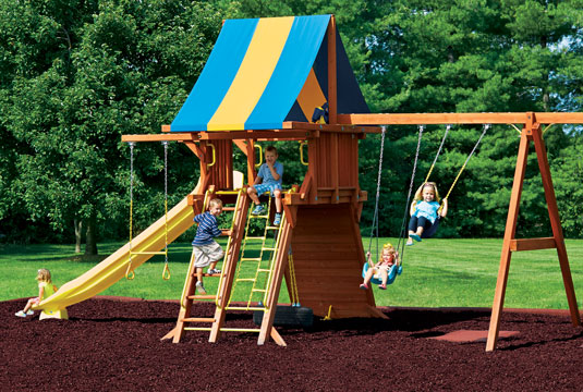Children playing on a playground with NuPlay Nuggets installed