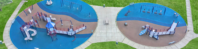 An areal view of two playgrounds with RubberBond installed