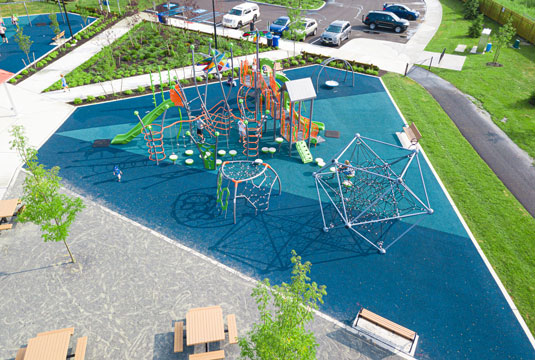 An aerial view of a playground with RubberBond installed
