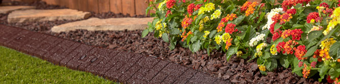 Recycled rubber landscaping products in a garden